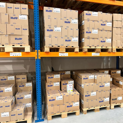 Shelves full of HiPP formula boxes in our warehouse